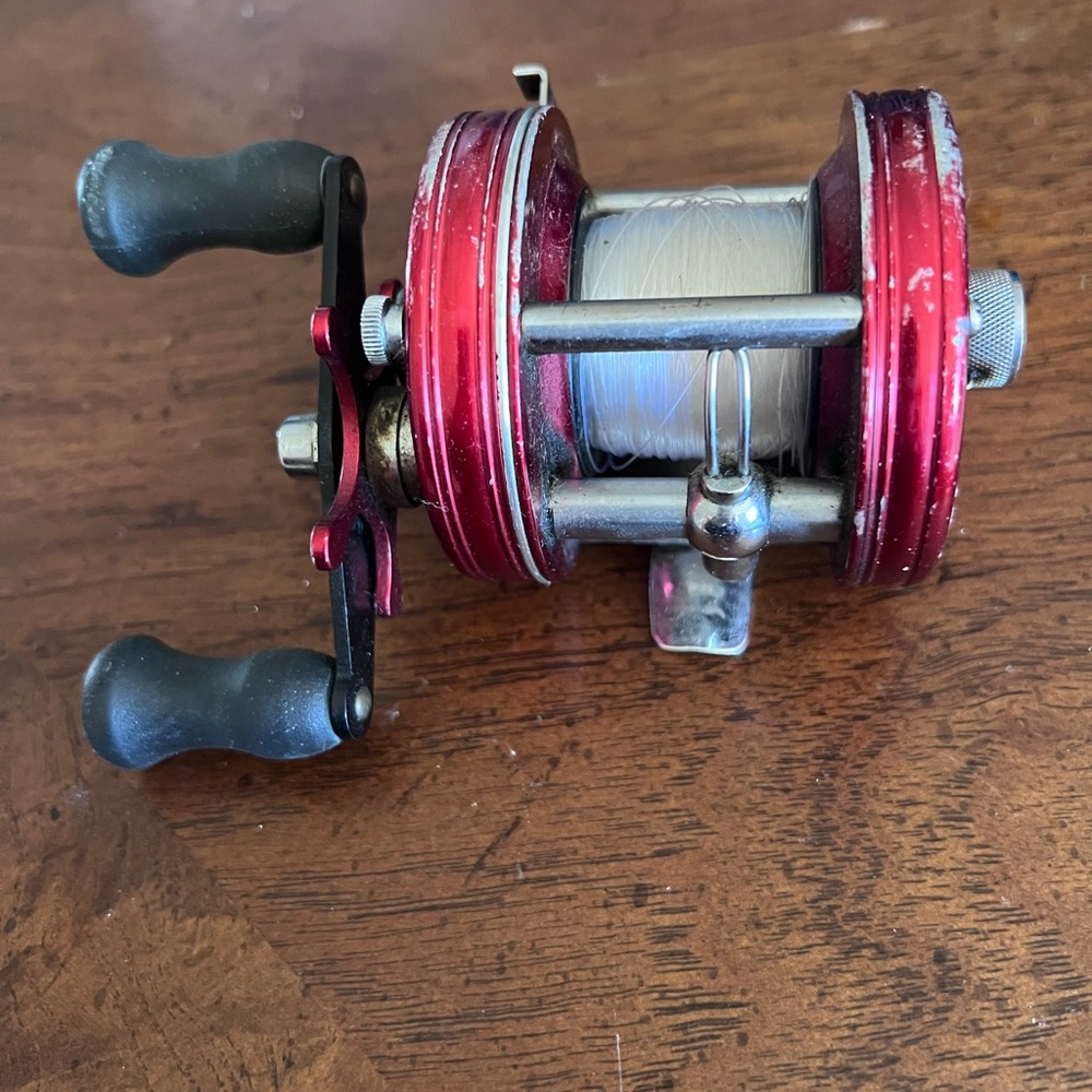 Vintage Abu Garcia Ambassadeur 5000 Red BaitcastiFishing Reel with Black Handles